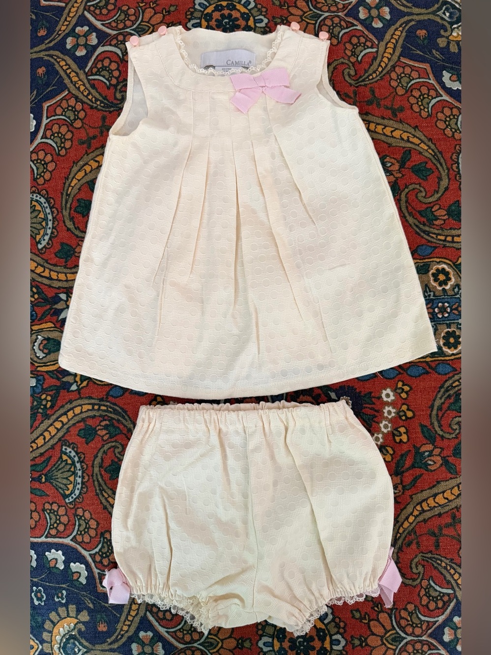 Camilla Cream Baby Dress with Pink Ribbon Accent
